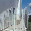 Wrought Iron Gate and Fence, curved with an upward rise on the curve